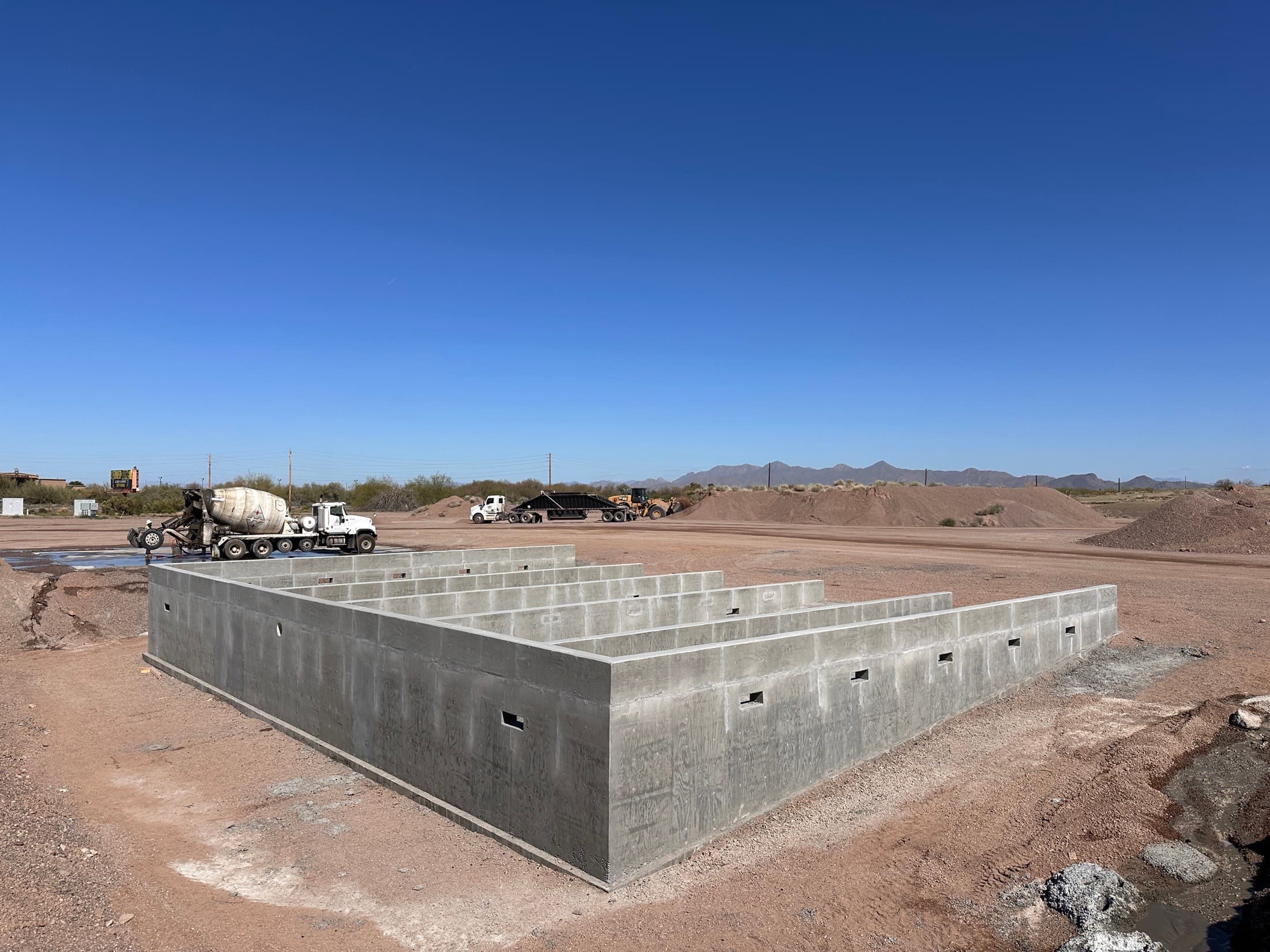 Completed cast-in-place bin walls at an aggregate plant