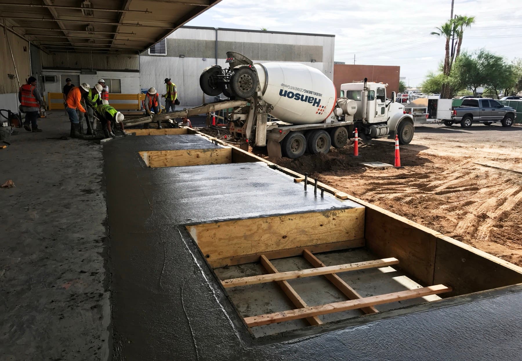 Dock leveler pits formed and reinforced