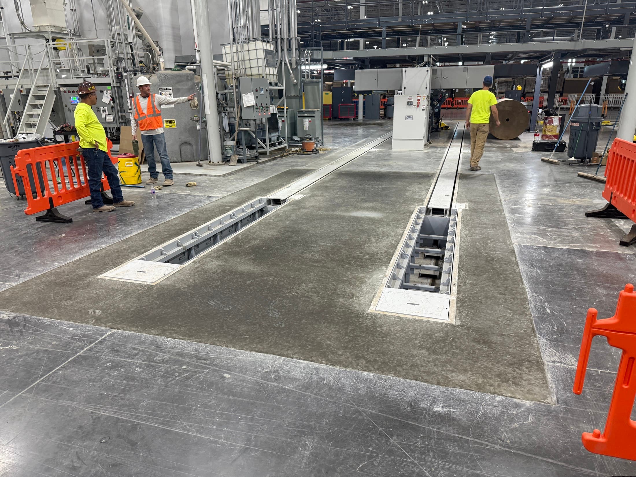 The finished trench and cover system flush with the plant floor